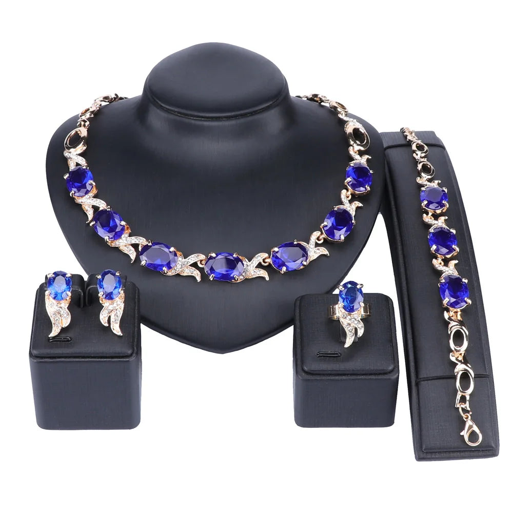 Parure Éclat Violet – Collier, bracelet, boucles d’oreilles et bague couleur or