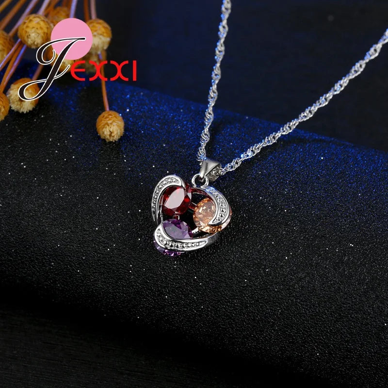 arure Éclat Multicolore – Collier avec pendentif et boucles d’oreilles en cristal